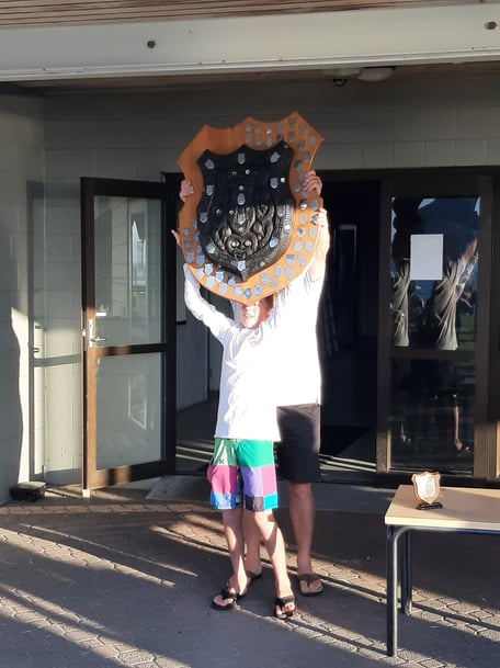 Oli Stone Holding the Wihau Shield aloft